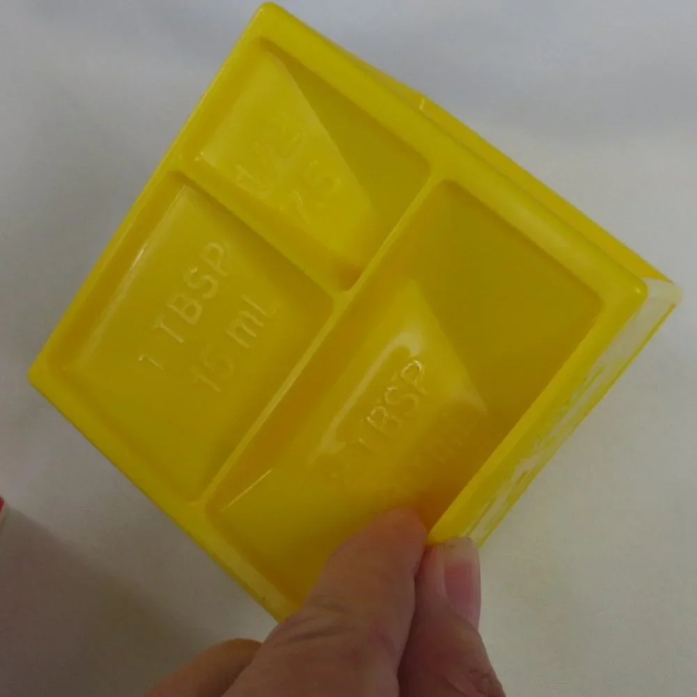 4/$14 THE KITCHEN CUBE-NEW-NEVER USED-YELLOW-All-in-One Measuring Cup